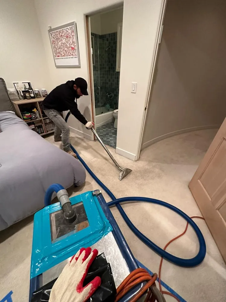 Burst pipe flooding repair service team responding to emergency pipe damage in a Riverside County home